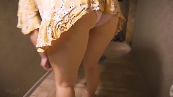Horny Housewife Shows Off Her Ass In The Living Room